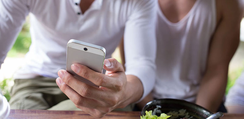 Image of call phone in hand. Photo Credit: Copyright: sutichak / 123RF Stock Photo